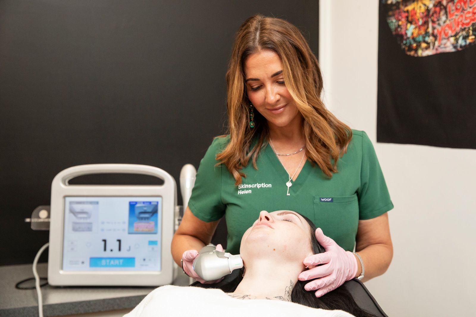Helen with a client in the treatment room